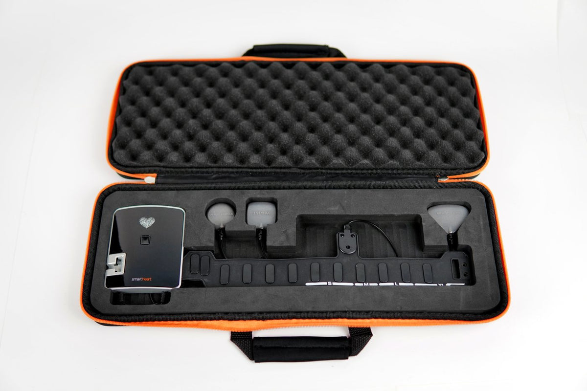 Open SmartHeart carry case with the device, belt and electrodes